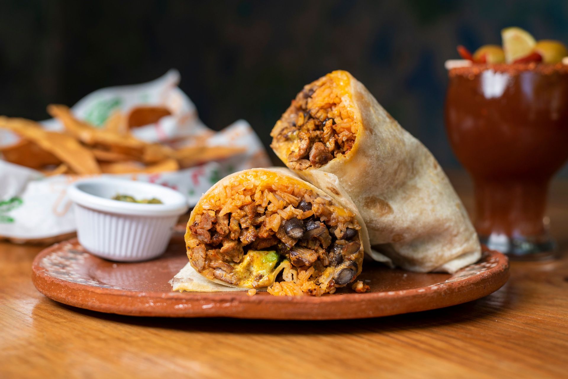 A scrumptious Mexican burrito filled with rice, beans, and beef, perfect for a hearty meal.